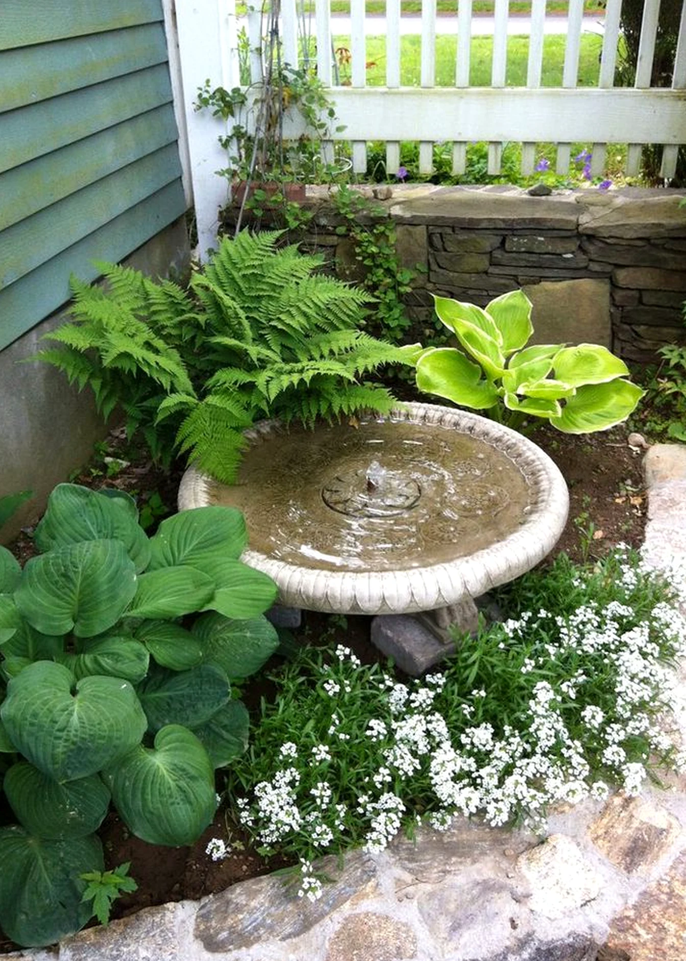 Balanced stone path gives the design more light, so the whole view feels quietly finished.