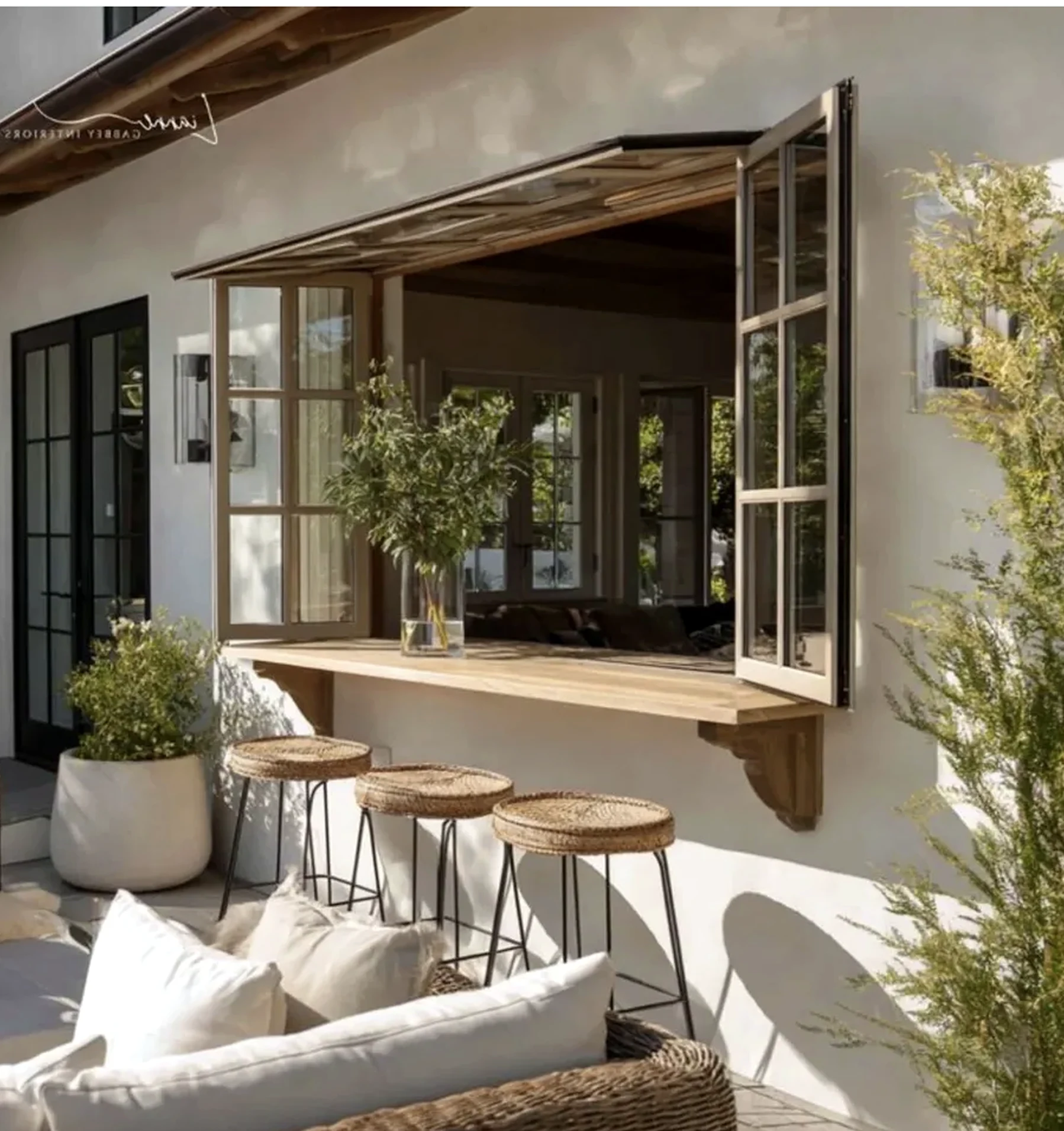Subtle patio corner adds a clear layer of softness, helping the composition feel fresh and intentional.