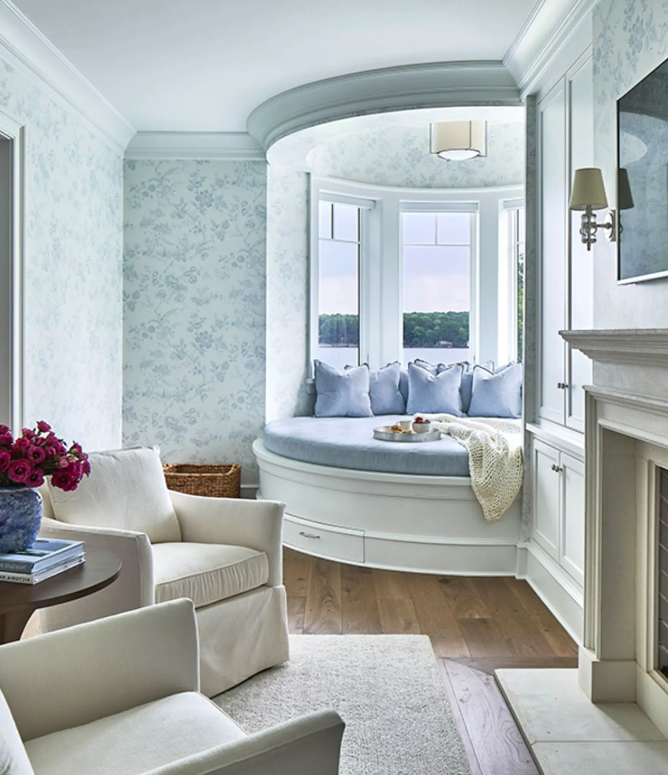 Fresh lamp detail anchors the entry with charm, giving the view a mood that feels quietly finished.