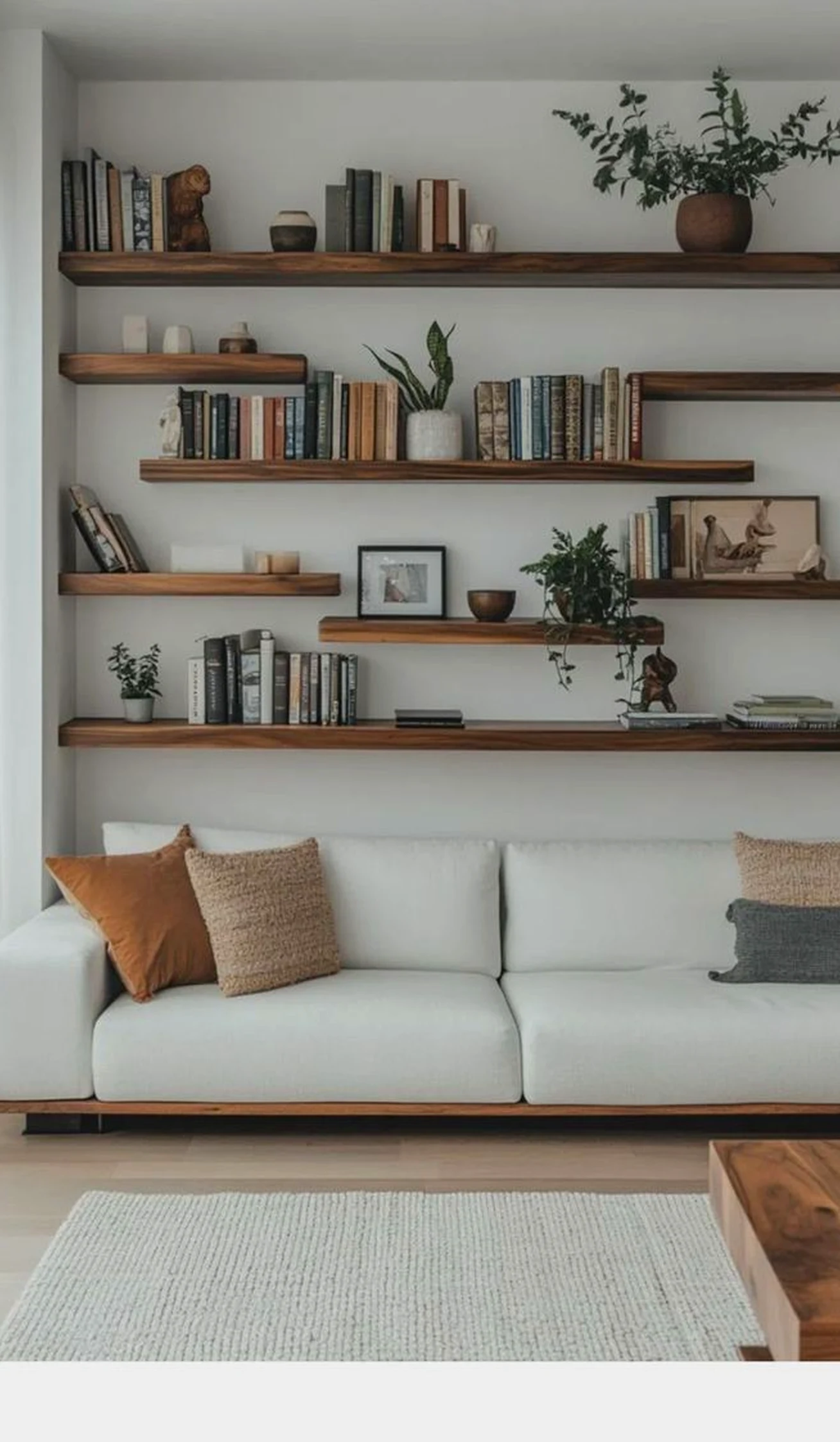 Tactile green entry adds a clear layer of shape, helping the wall feel visually grounded.