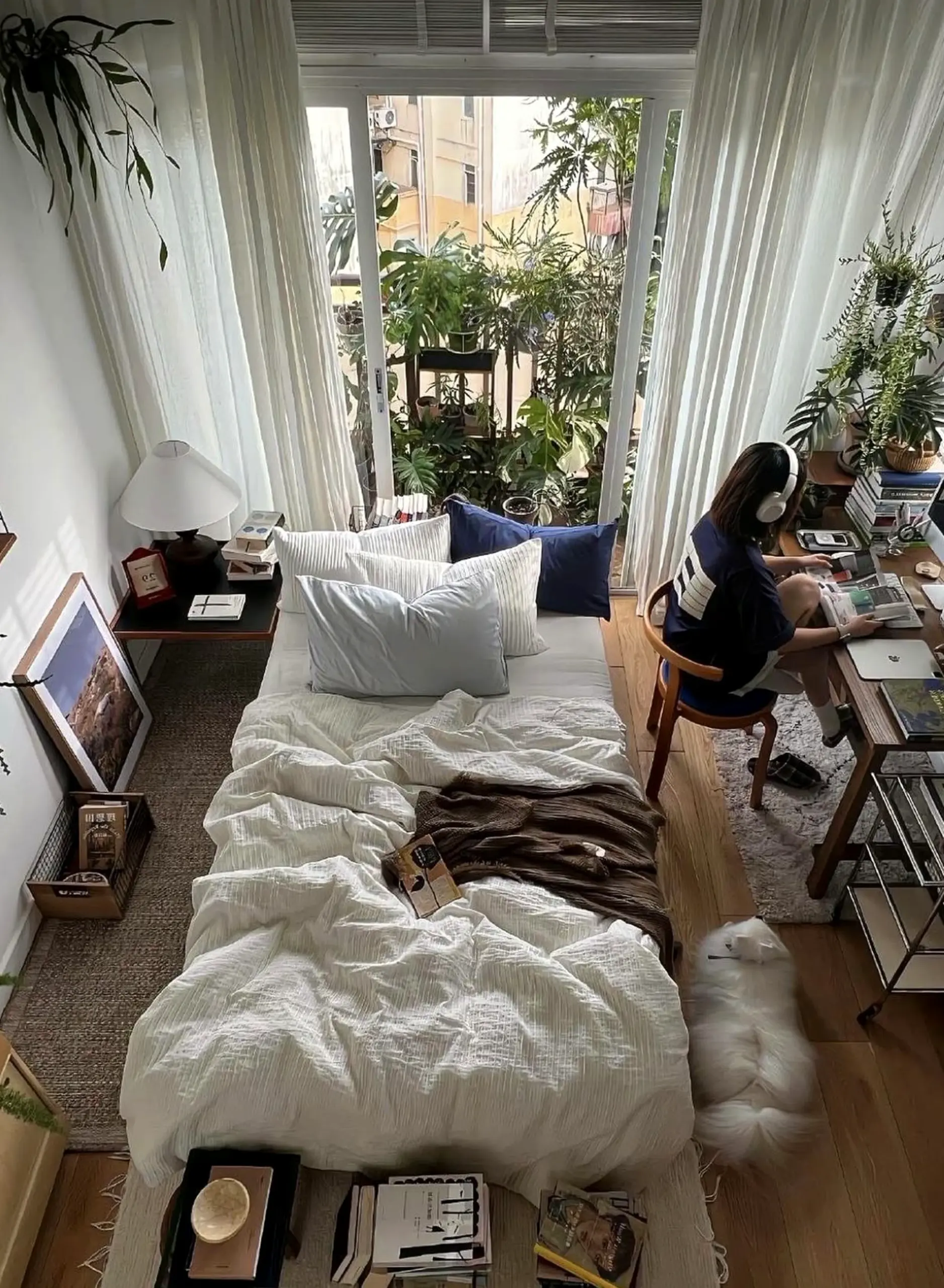 Leafy compact workspace brings charm to the room, creating a mood that feels personal and relaxed.