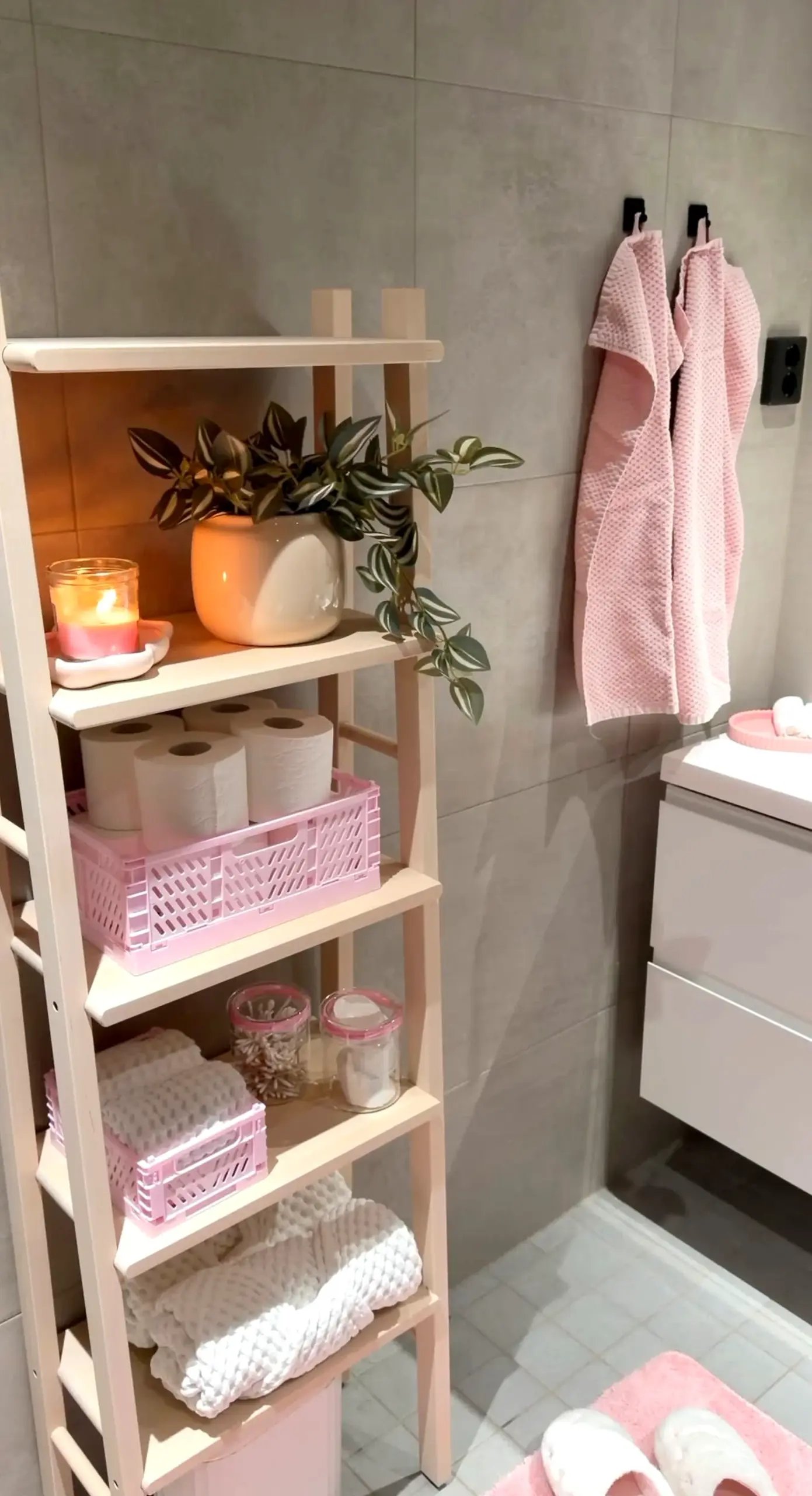 Calm storage corner frames the entry with order, making the scene feel clear and inviting.
