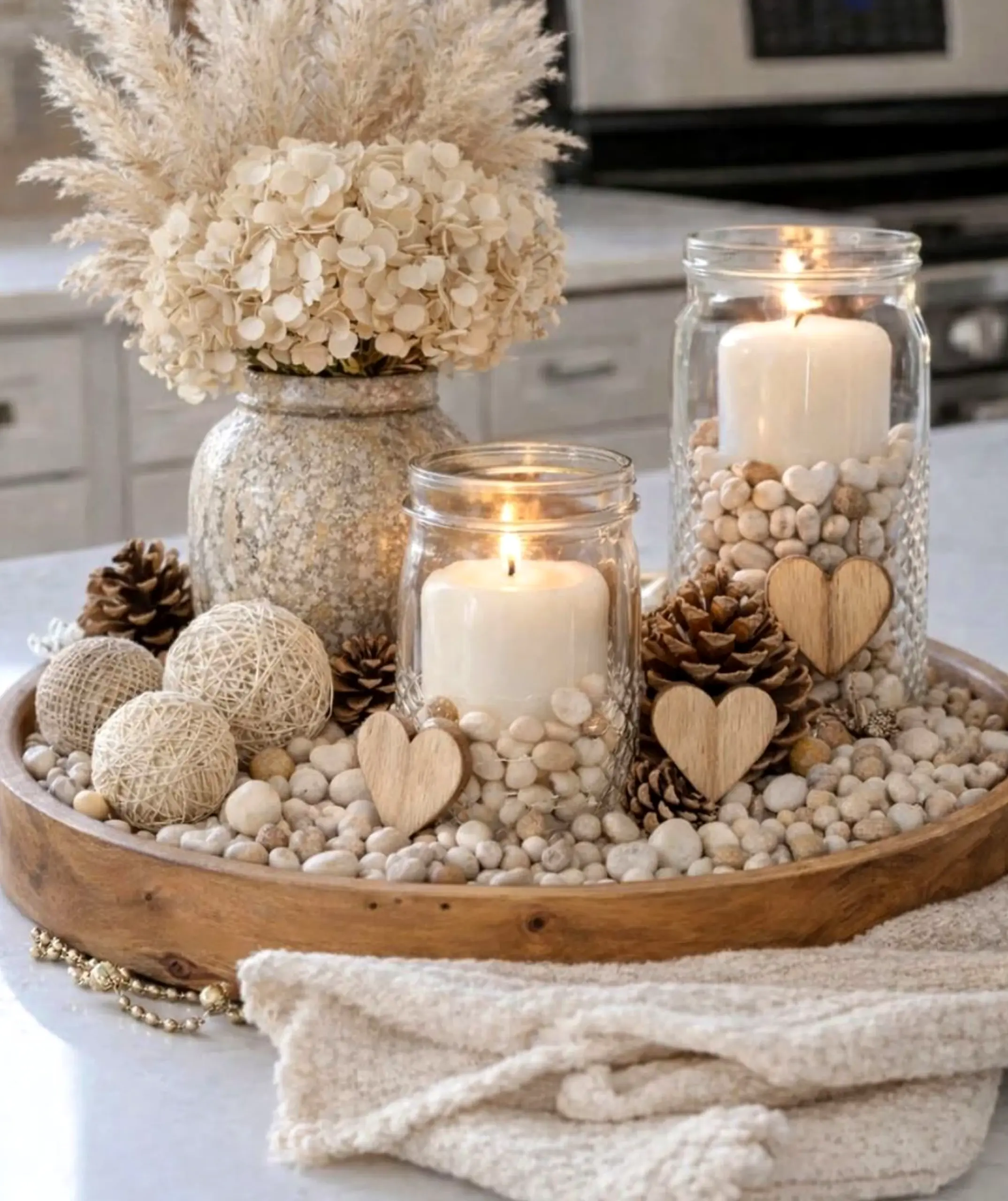 Sculptural flower arrangement adds personality across the sitting area, giving the decor a finish that feels open and lived-in.