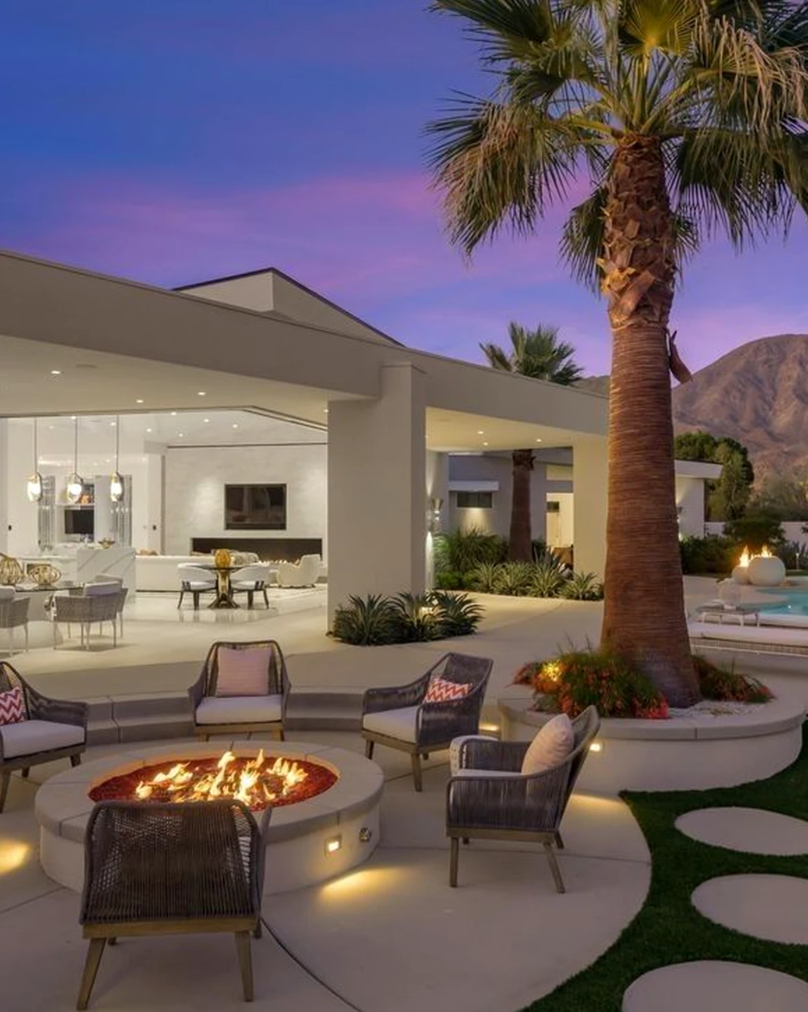 Inviting arched doorway anchors the sitting area with depth, giving the view a mood that feels quietly finished.