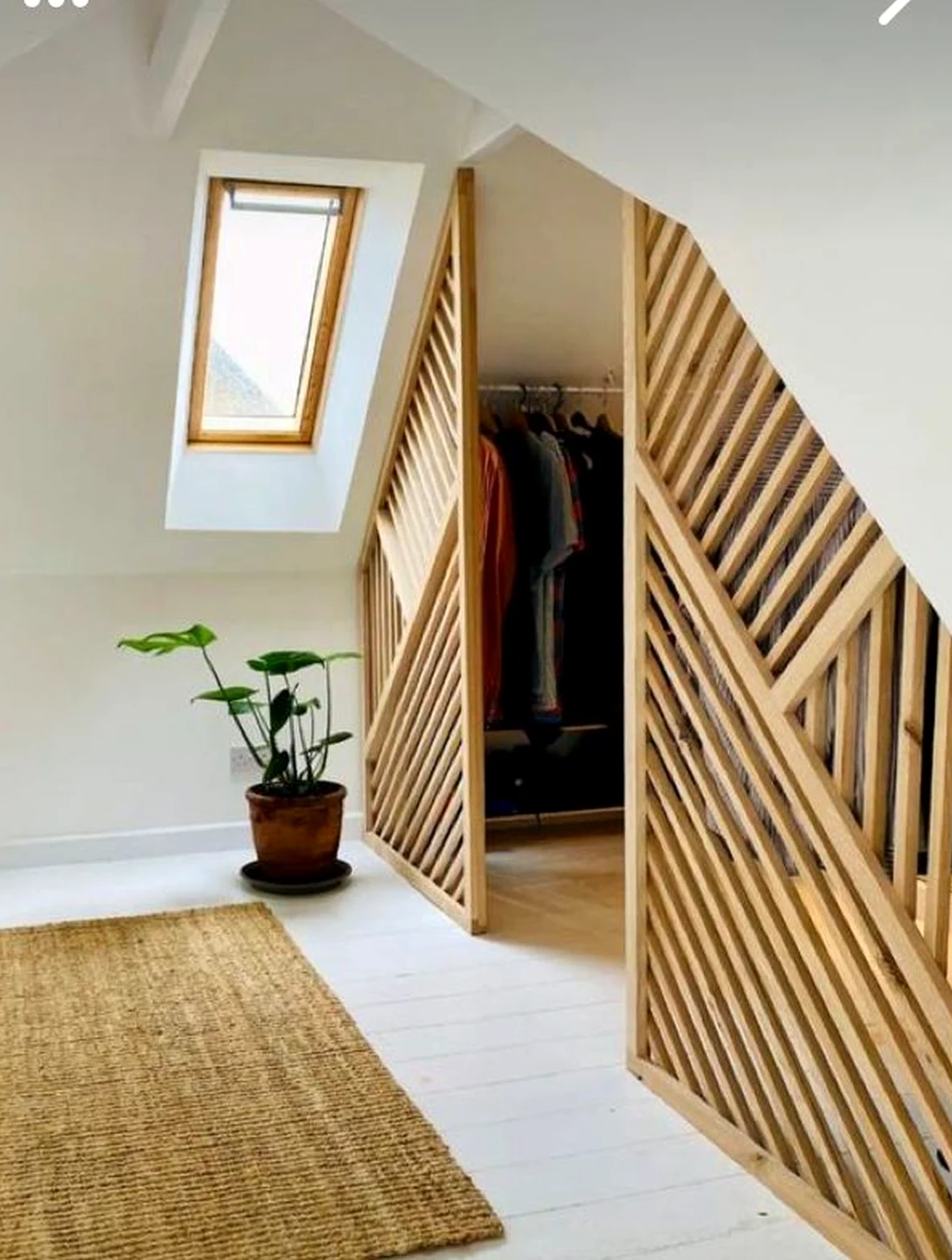 Quiet sink area draws attention to warmth while the entry stays quietly finished.