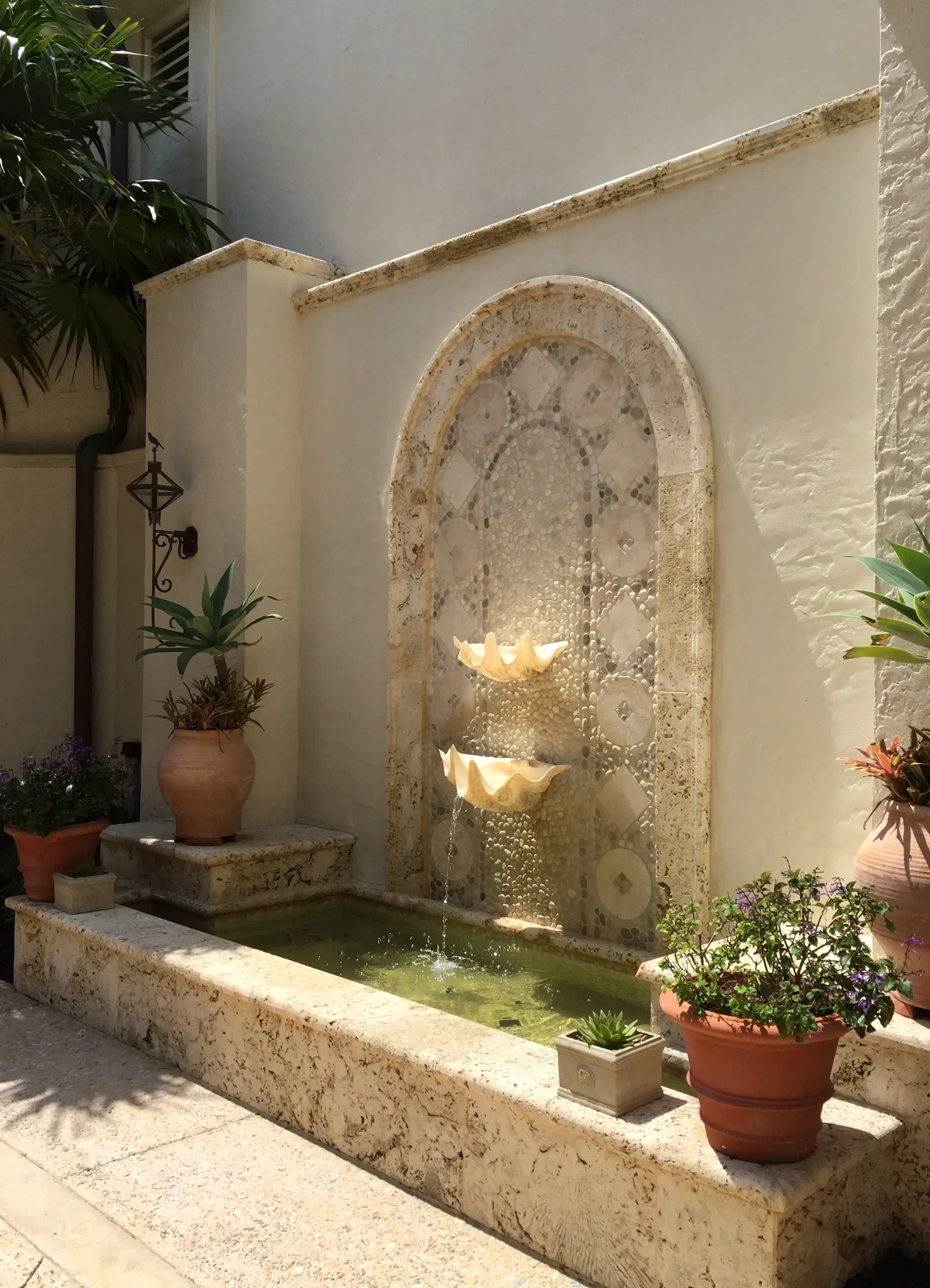 Crisp wall niche frames the corner with texture, making the scene feel personal and relaxed.