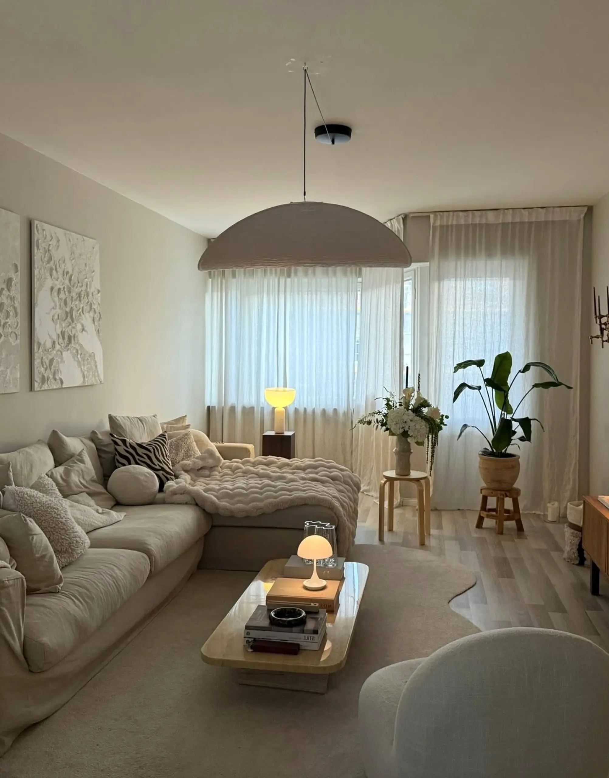 Natural kitchen nook supports the wall through shape, leaving the space feeling settled and welcoming.