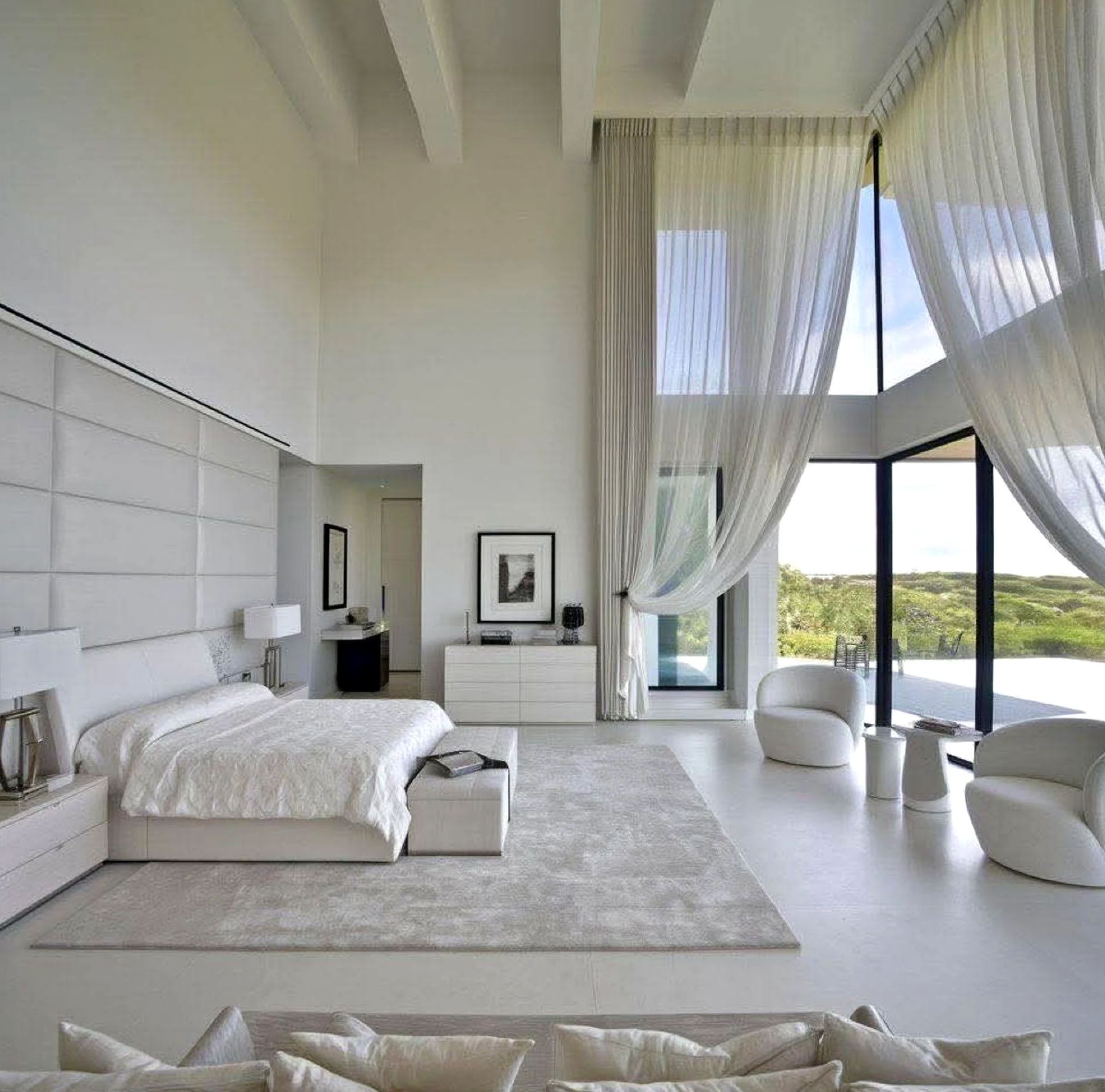 Open arched doorway brings a useful note of movement, making the room feel fresh and intentional.