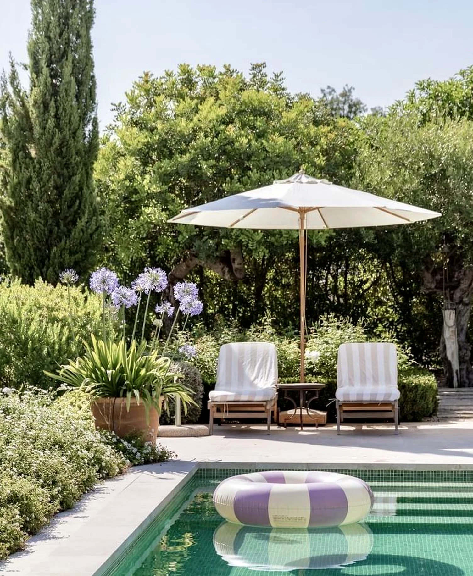 Warm balcony scene brings a useful note of softness, making the setting feel open and lived-in.