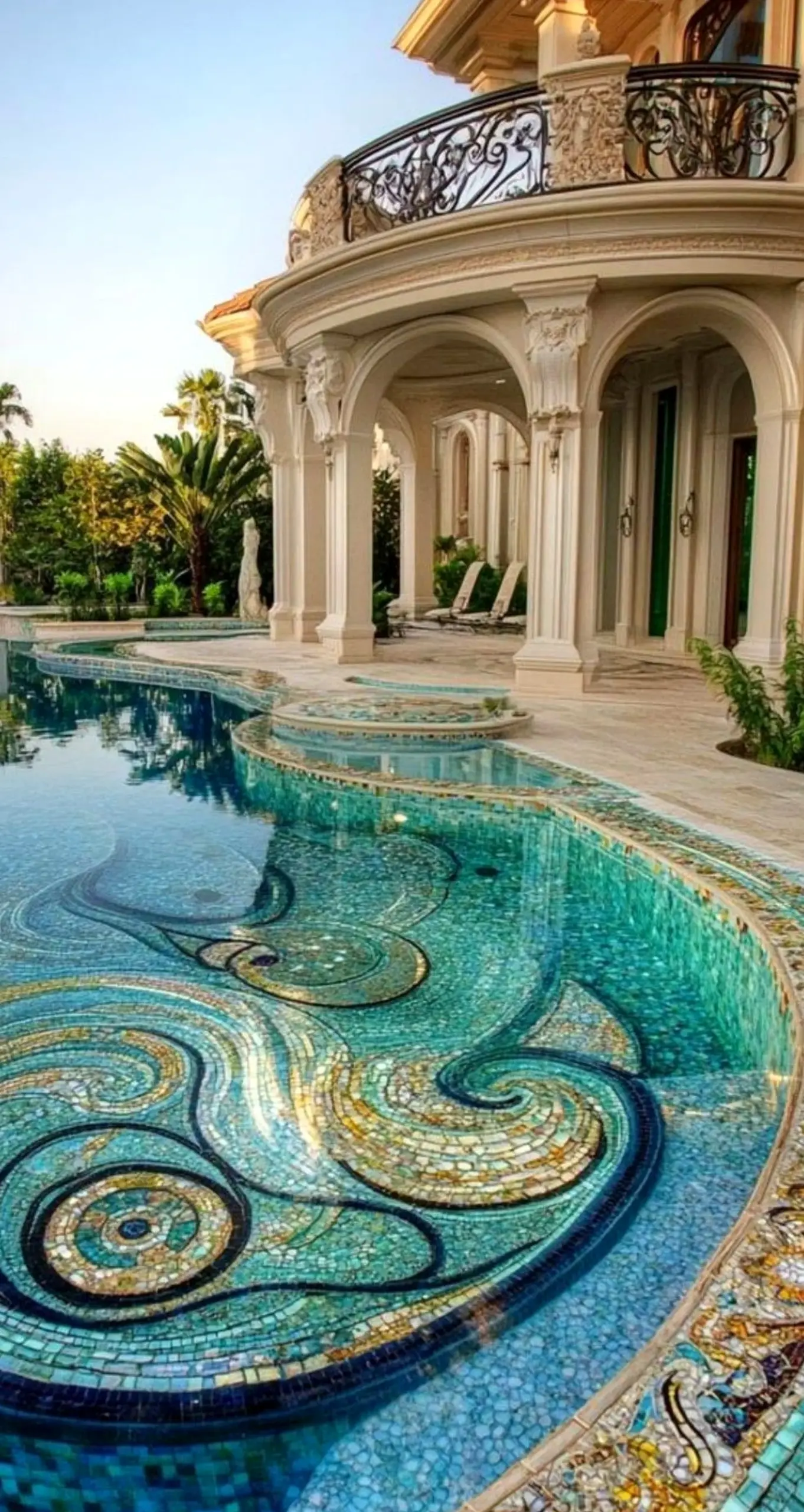 Textured stone terrace brings contrast to the garden edge, creating a mood that feels open and lived-in.