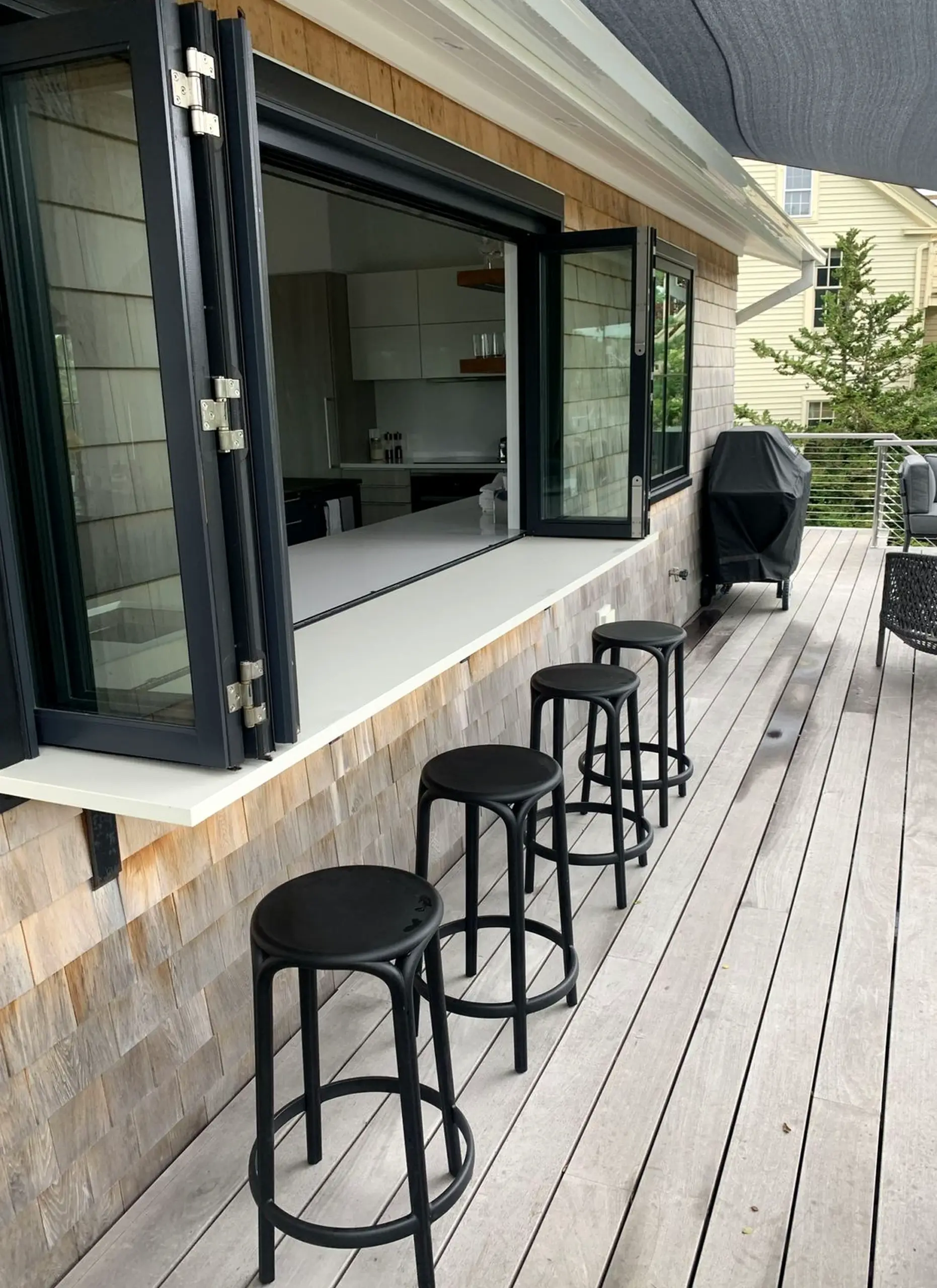 Colorful courtyard view brings ease to the design, creating a mood that feels warm without clutter.